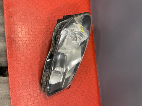 Volkswagen Caddy HEADLIGHT ASSEMBLY Driver's Side (with Scratches please see photos & 1 bulb missing) P/N TYC2012473152